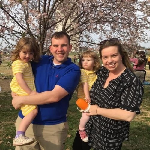 1359b29a-53b9-4190-9cd7-20cc492bd3cd A family are smiling at Charlottesville